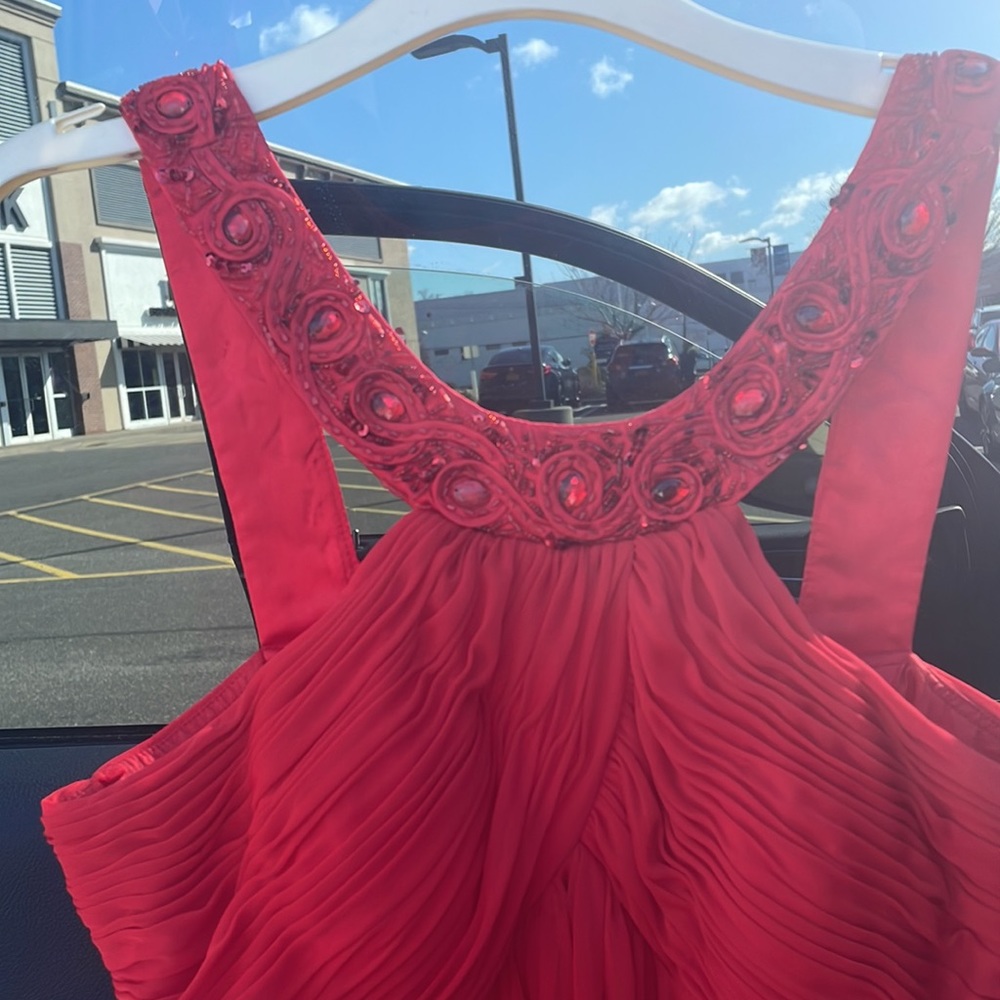 Long dress pretty beated strap along the front and back roost top and straight